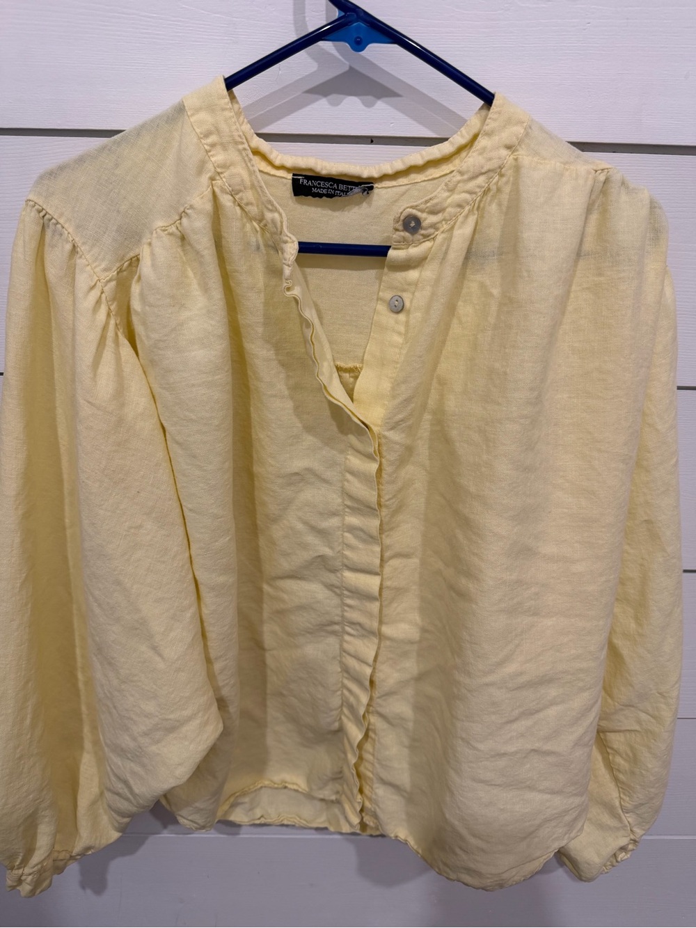 Francesca’s oversize Pale Yellow Ruffle-Trim Button Blouse